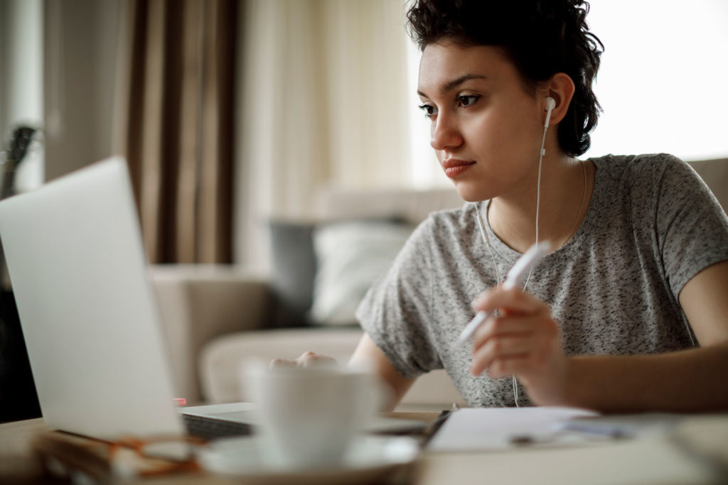 girl at a computer studying